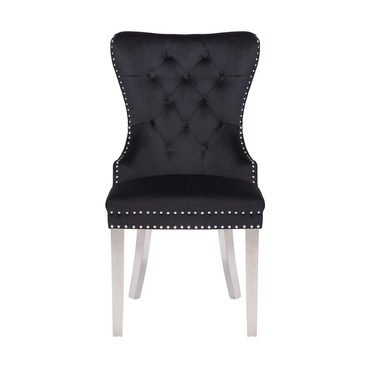 Black velvet tufted dining chair with silver nailhead trim and sleek metal legs