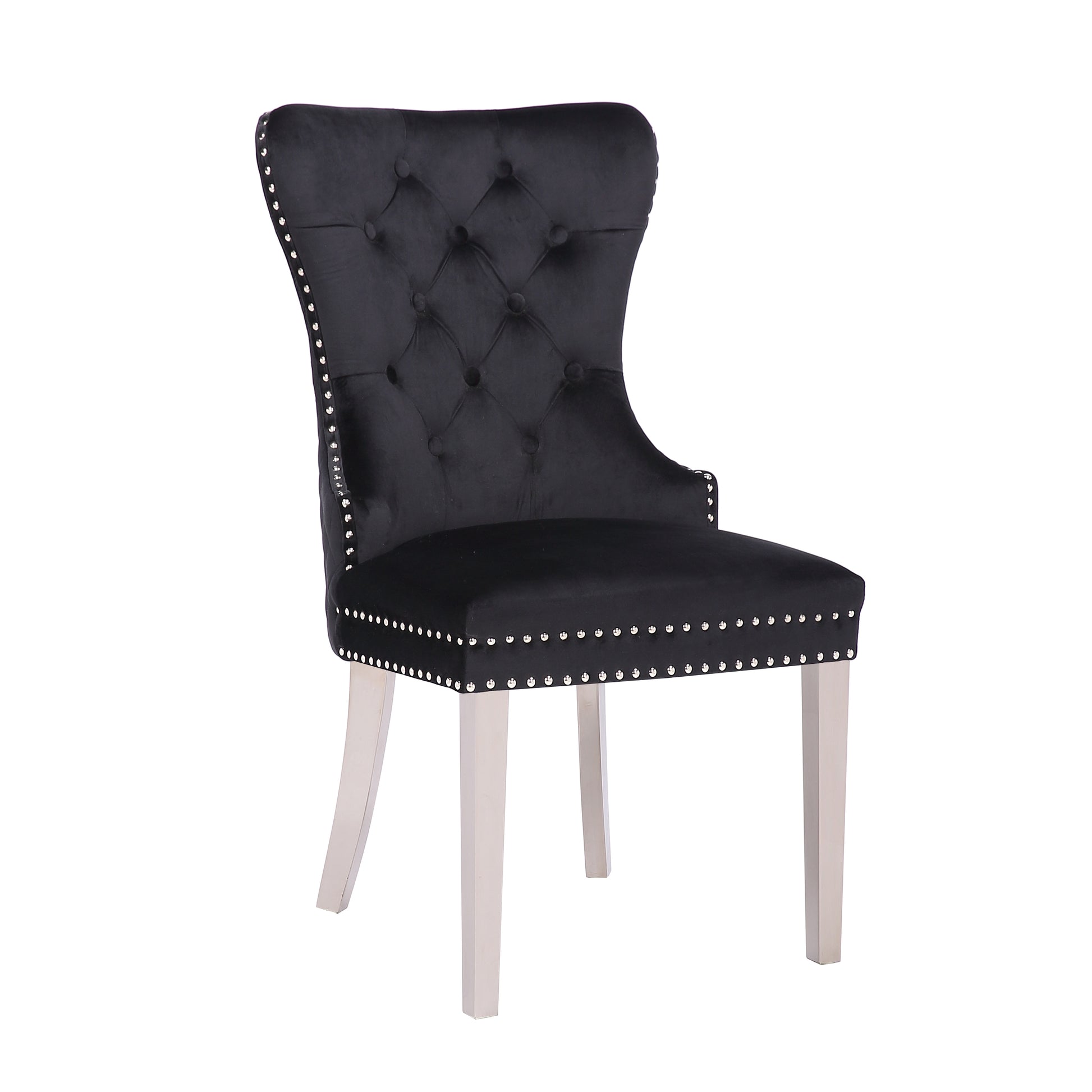 Black velvet dining chair with tufted back and nailhead trim