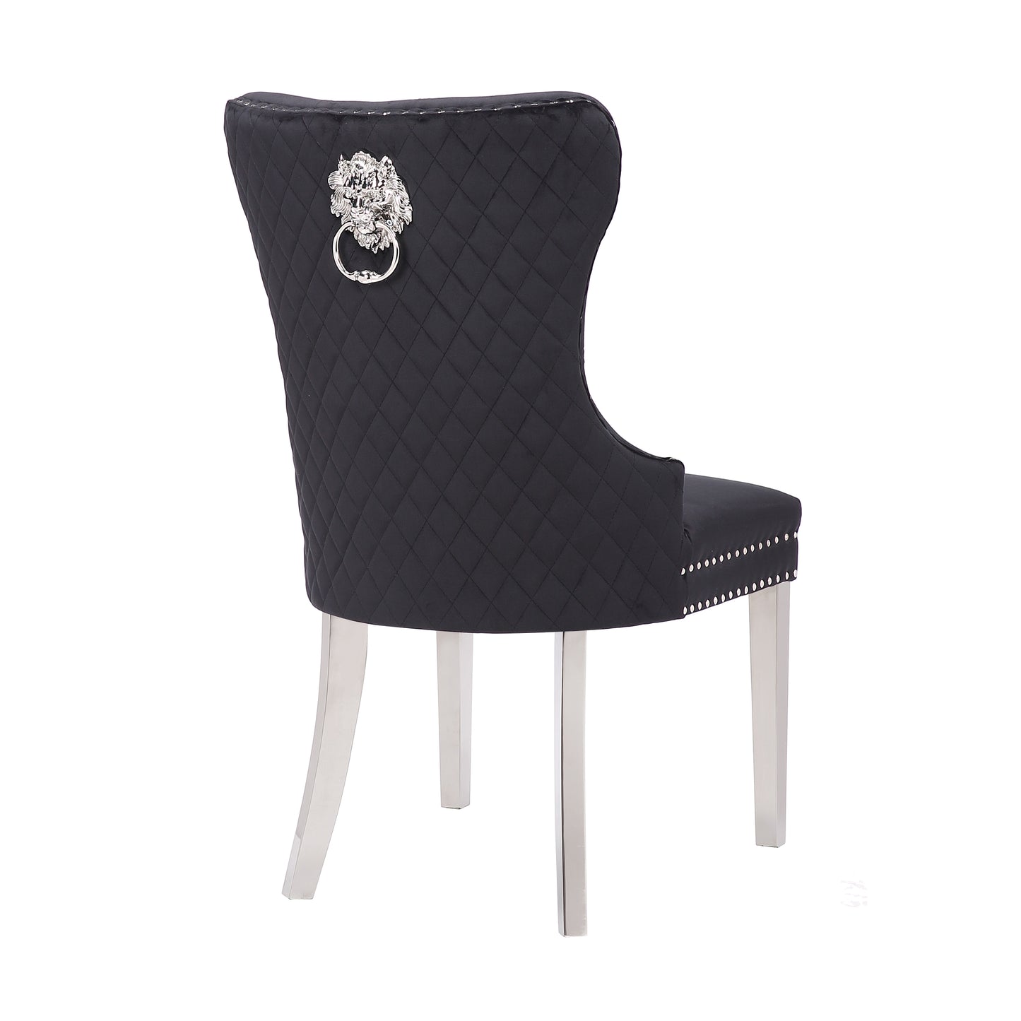 Black velvet dining chair with diamond tufting and lion knocker