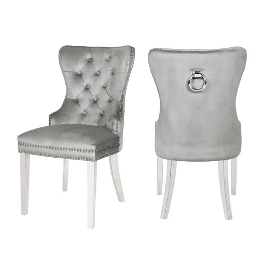 Elegant grey velvet dining chairs with tufted back and silver studding detail