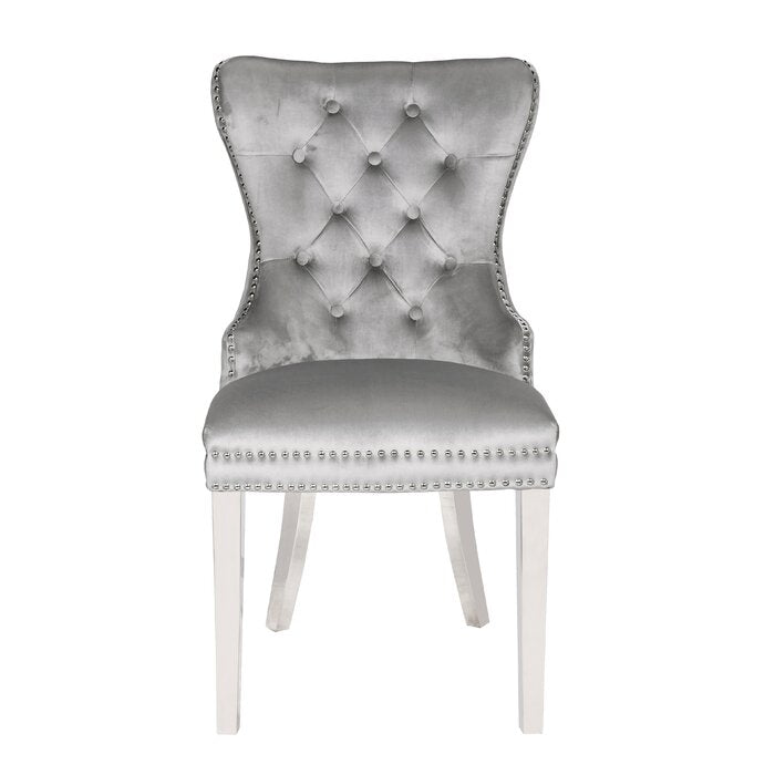 Silver velvet dining chair with diamond tufting and nailhead trim