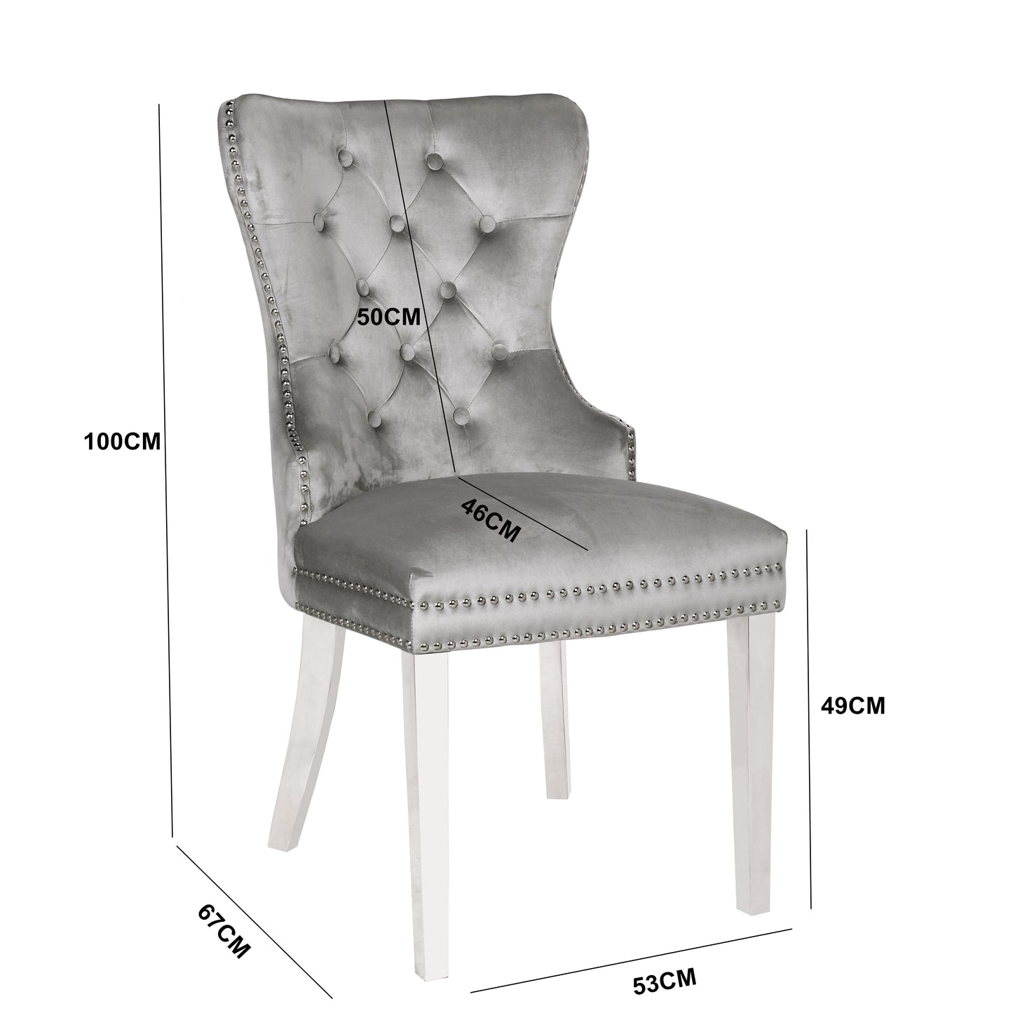 Grey velvet wingback chair with button tufting and silver nailhead trim