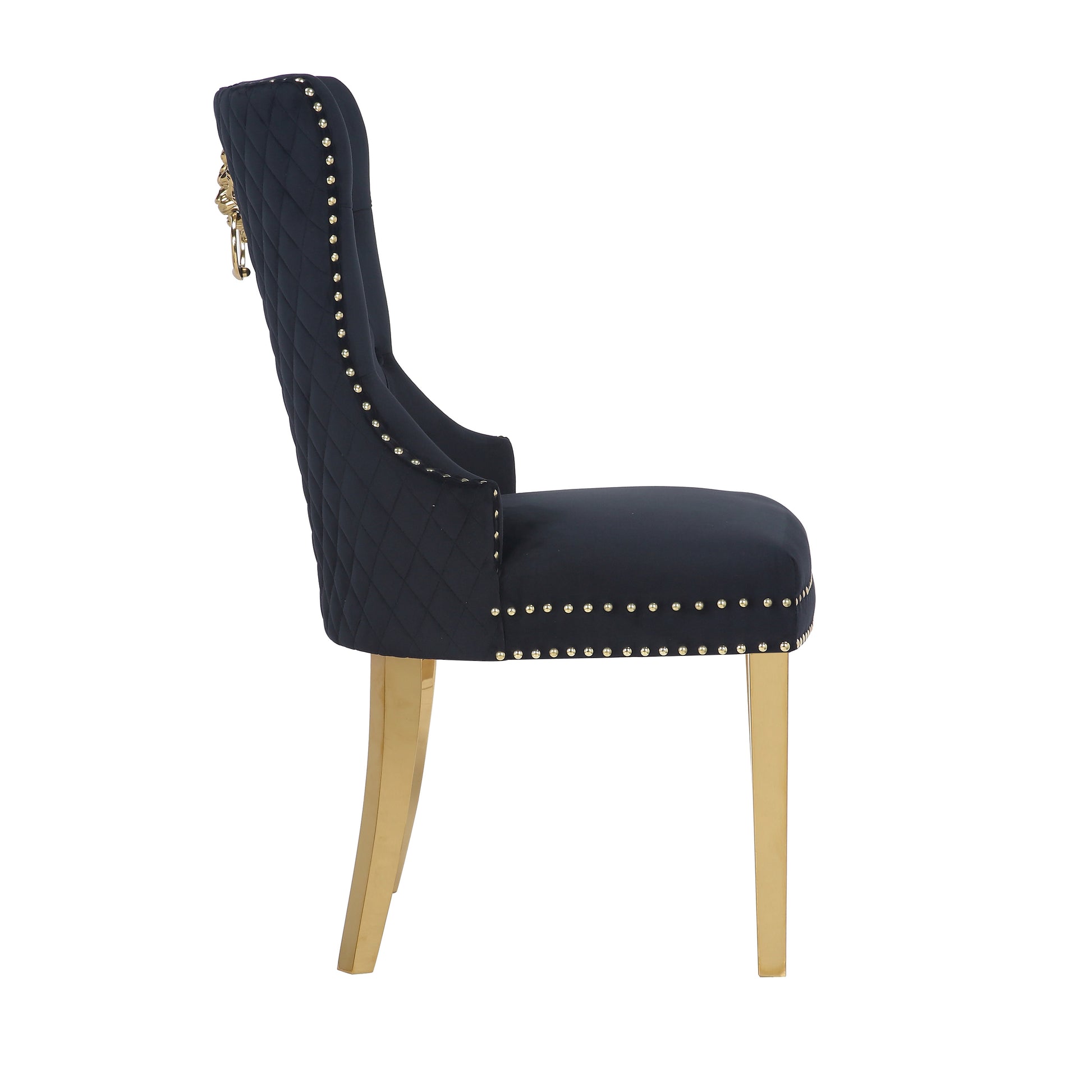 Deep blue velvet dining chair with diamond tufting and gold nailhead trim featuring a lion knocker