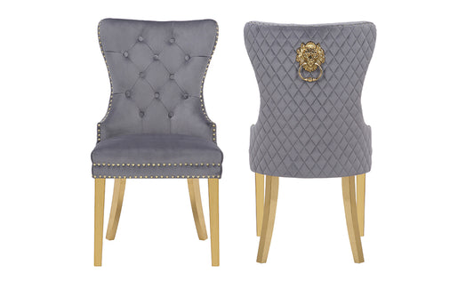 Grey velvet dining chair with tufted back and gold legs