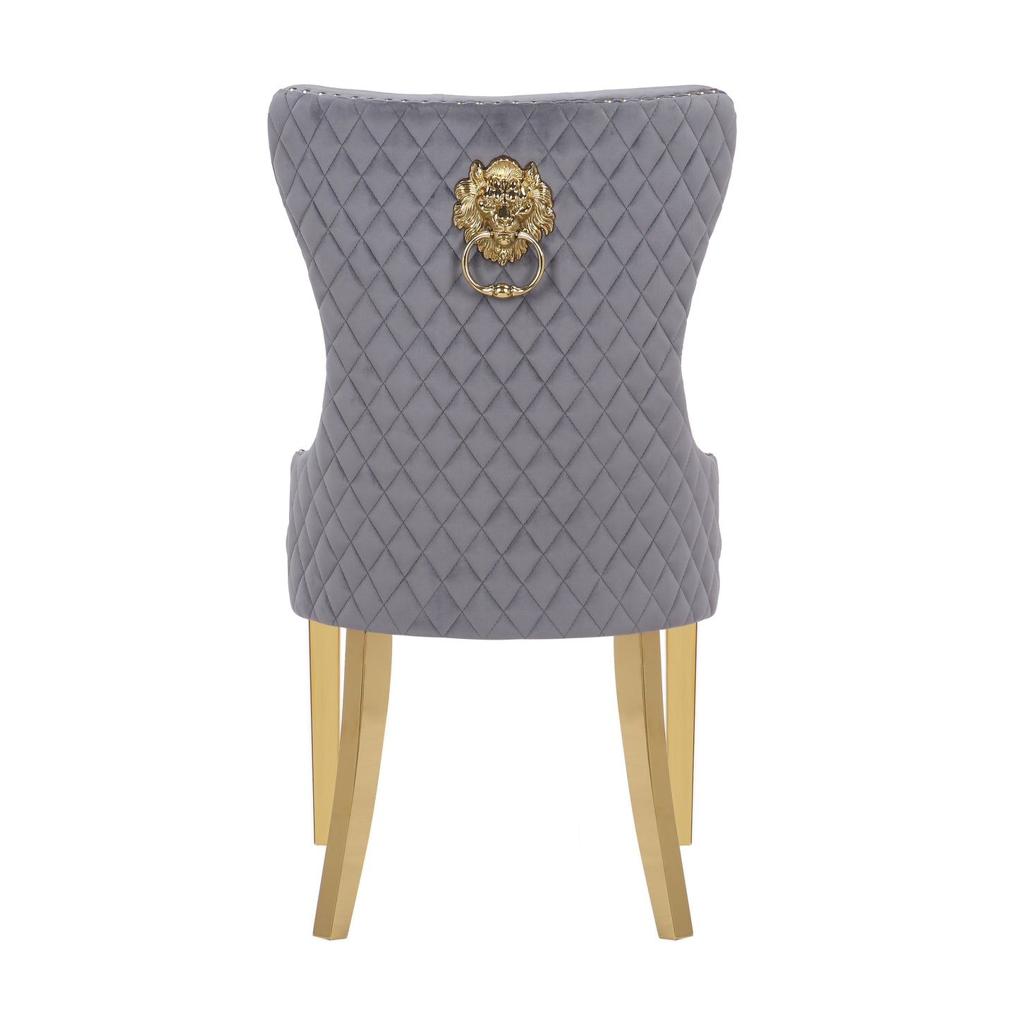 Grey velvet dining chair with diamond tufting and gold lion knocker