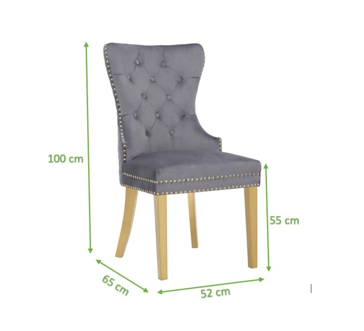 Grey velvet dining chair with button tufting and gold nailhead trim