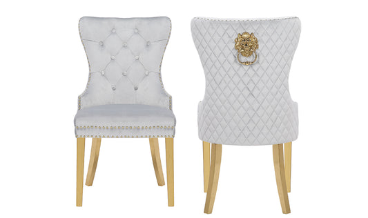 Light grey velvet dining chair with tufted back and gold legs