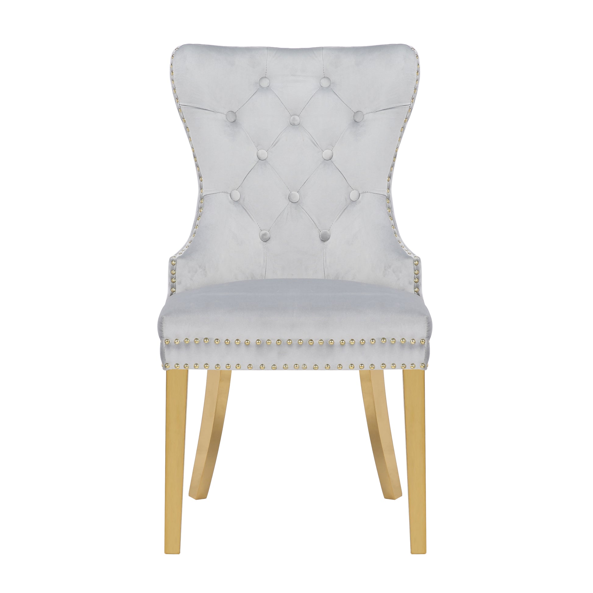 Light grey velvet dining chair with diamond tufting and gold nailhead trim