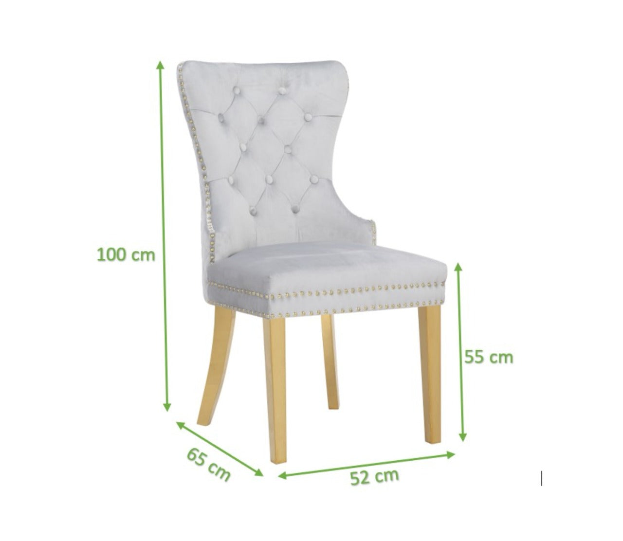 Light grey velvet dining chair with tufted back and brass nailhead trim on wooden legs