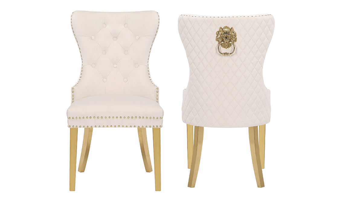 Elegant ivory velvet dining chair with diamond tufting and gold nailhead trim