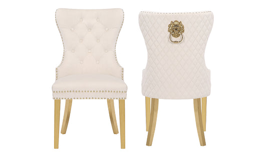 Elegant ivory velvet dining chair with diamond tufting and gold nailhead trim