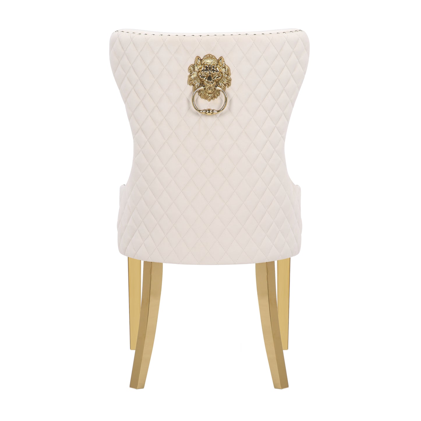 Cream upholstered dining chair with diamond tufting and gold lion head knocker