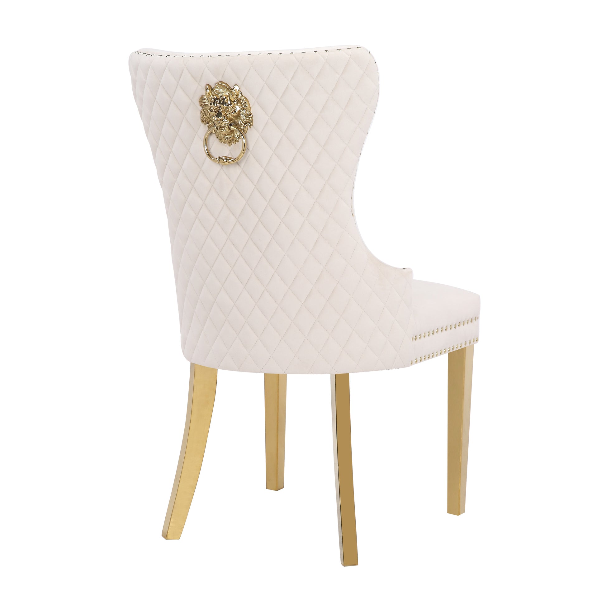Cream tufted dining chair with gold lion knocker and brass legs