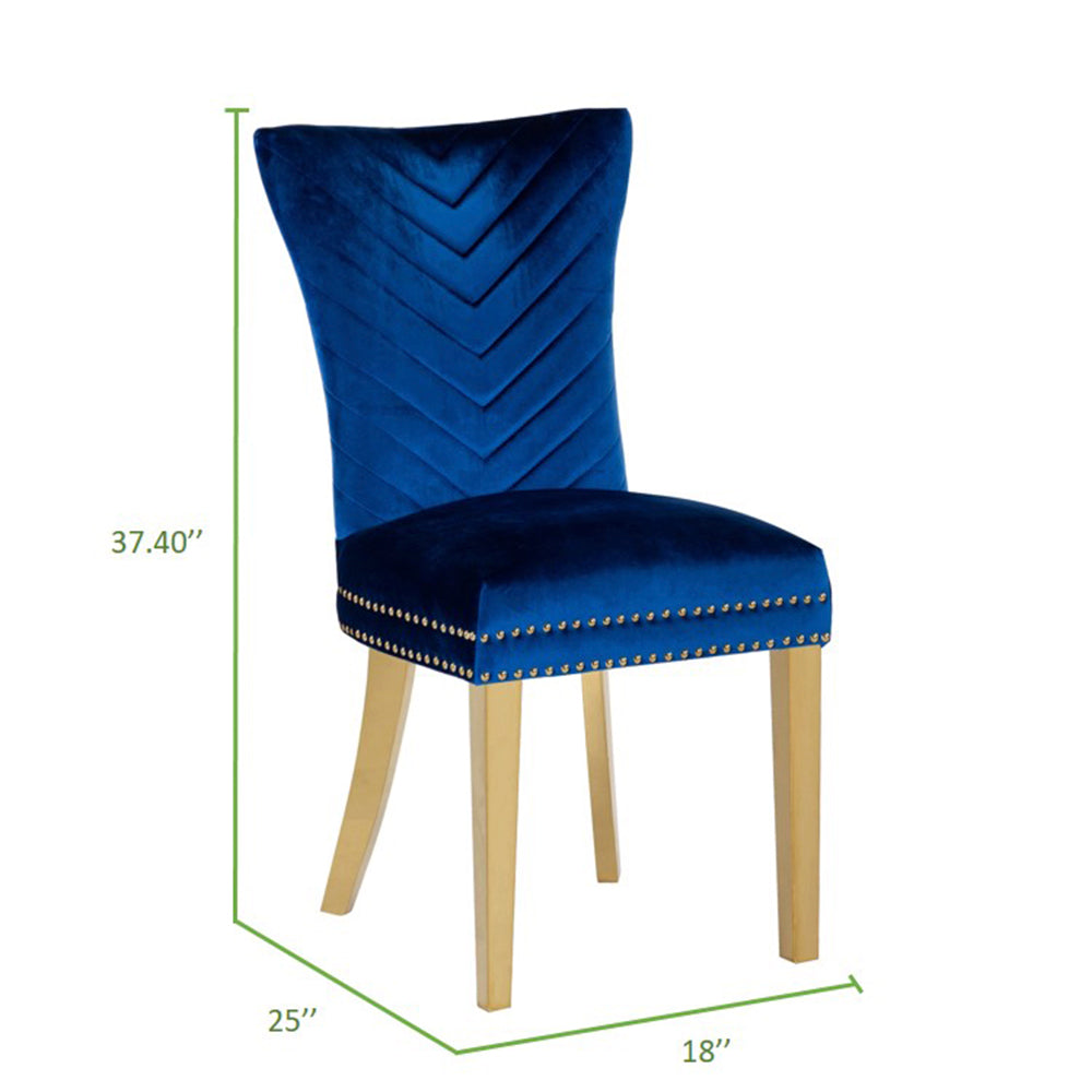 Elegant sapphire blue velvet dining chair with chevron back and gold nailhead trim perfect for modern homes