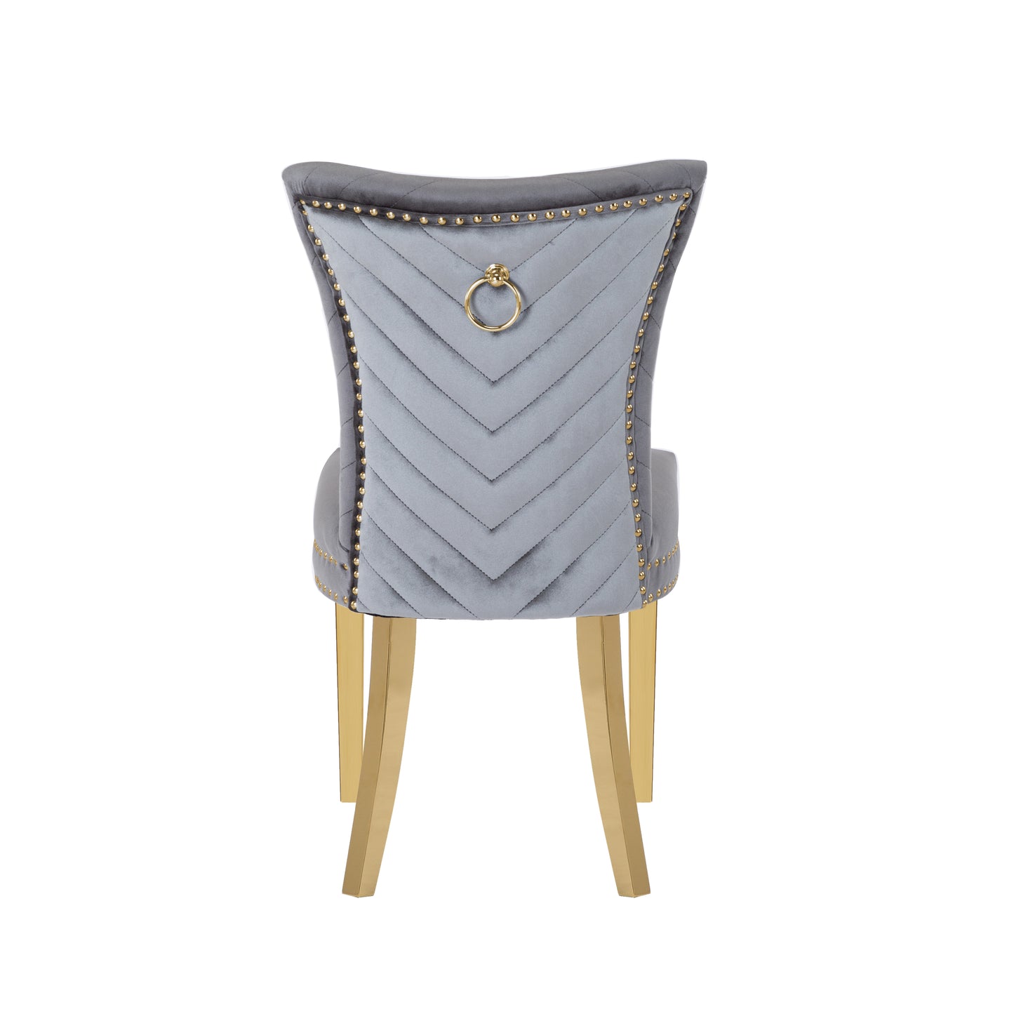 Elegant grey velvet dining chair with gold ring pull and brass legs