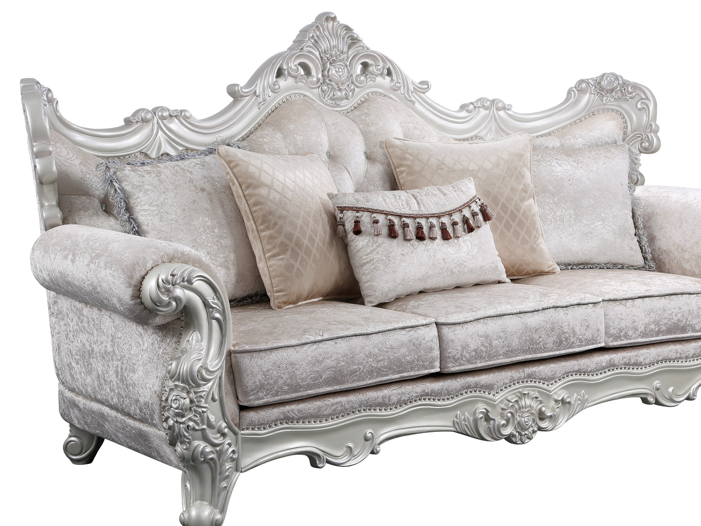 Antique white baroque sofa with ornate carved details and patterned upholstery