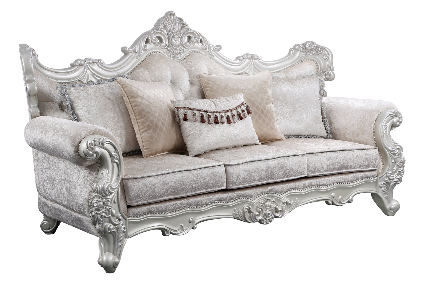 Opulent silver baroque sofa with intricate carvings and plush champagne upholstery