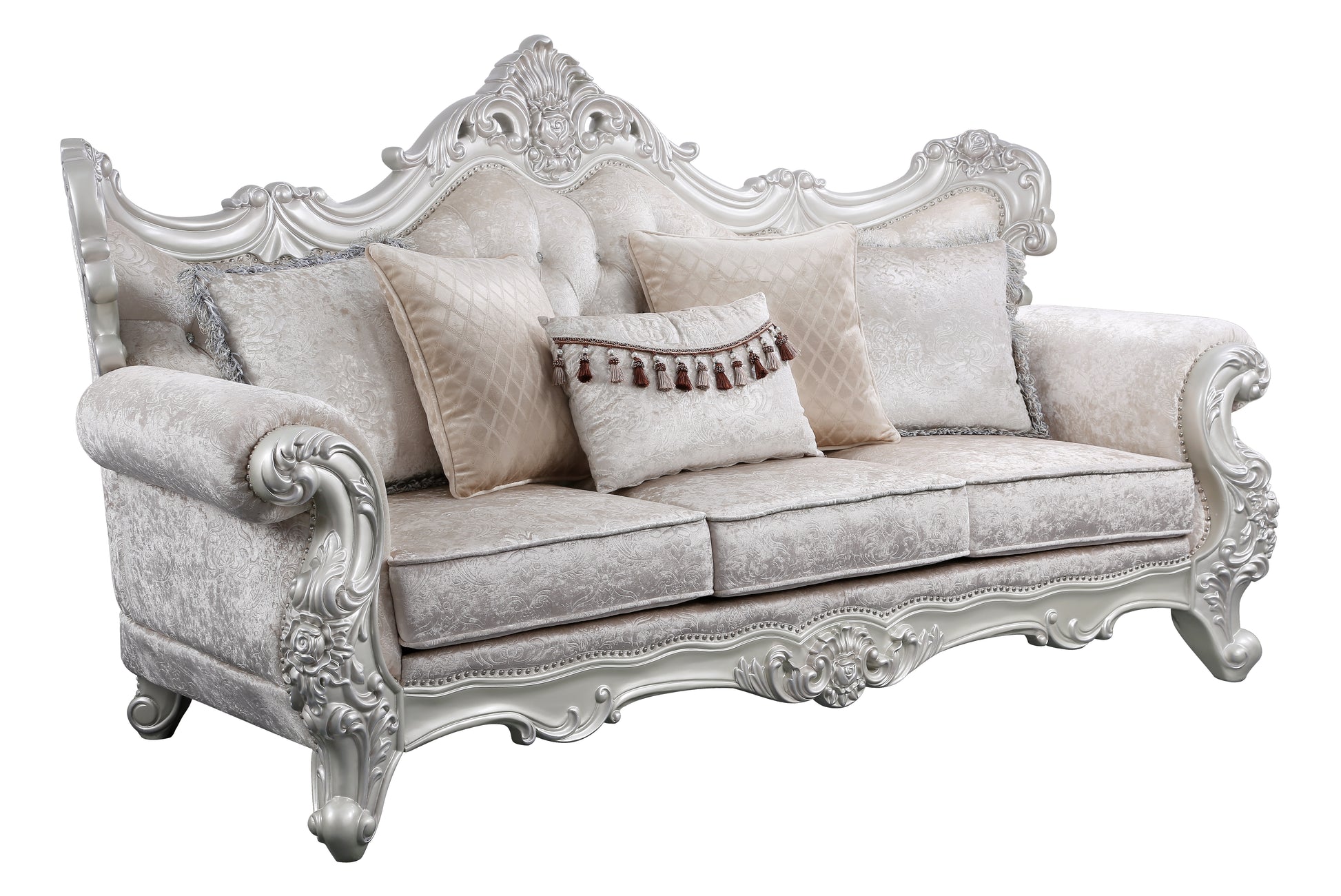Opulent silver baroque sofa with intricate carvings and plush champagne upholstery