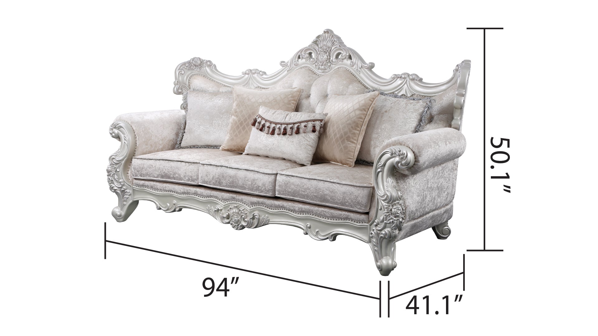 Ornate cream velvet sofa with tufted back plush cushions and intricate silver wood trim Ideal for elegant living rooms