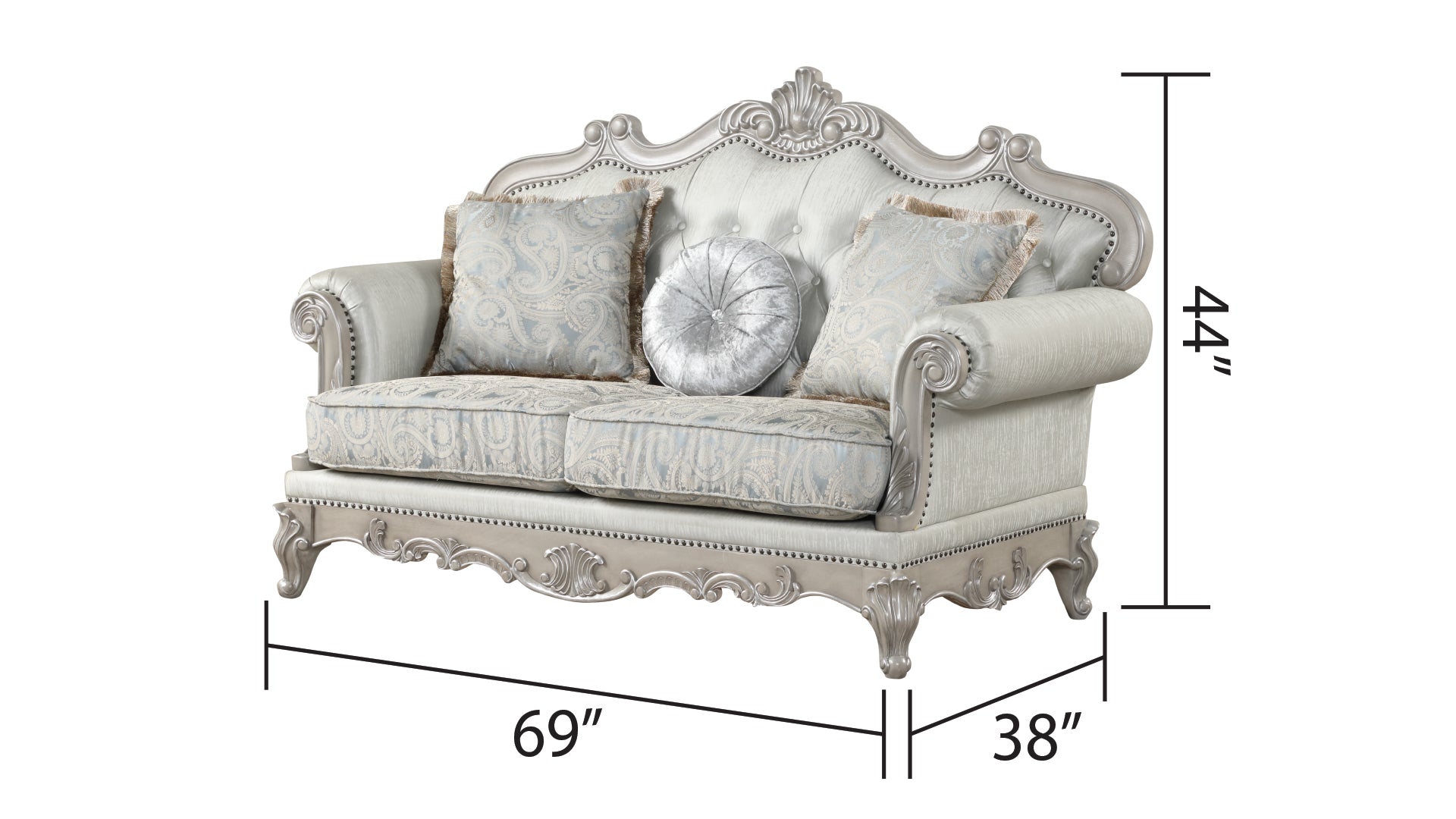 Silver upholstered loveseat with ornate detailing and paisley cushions