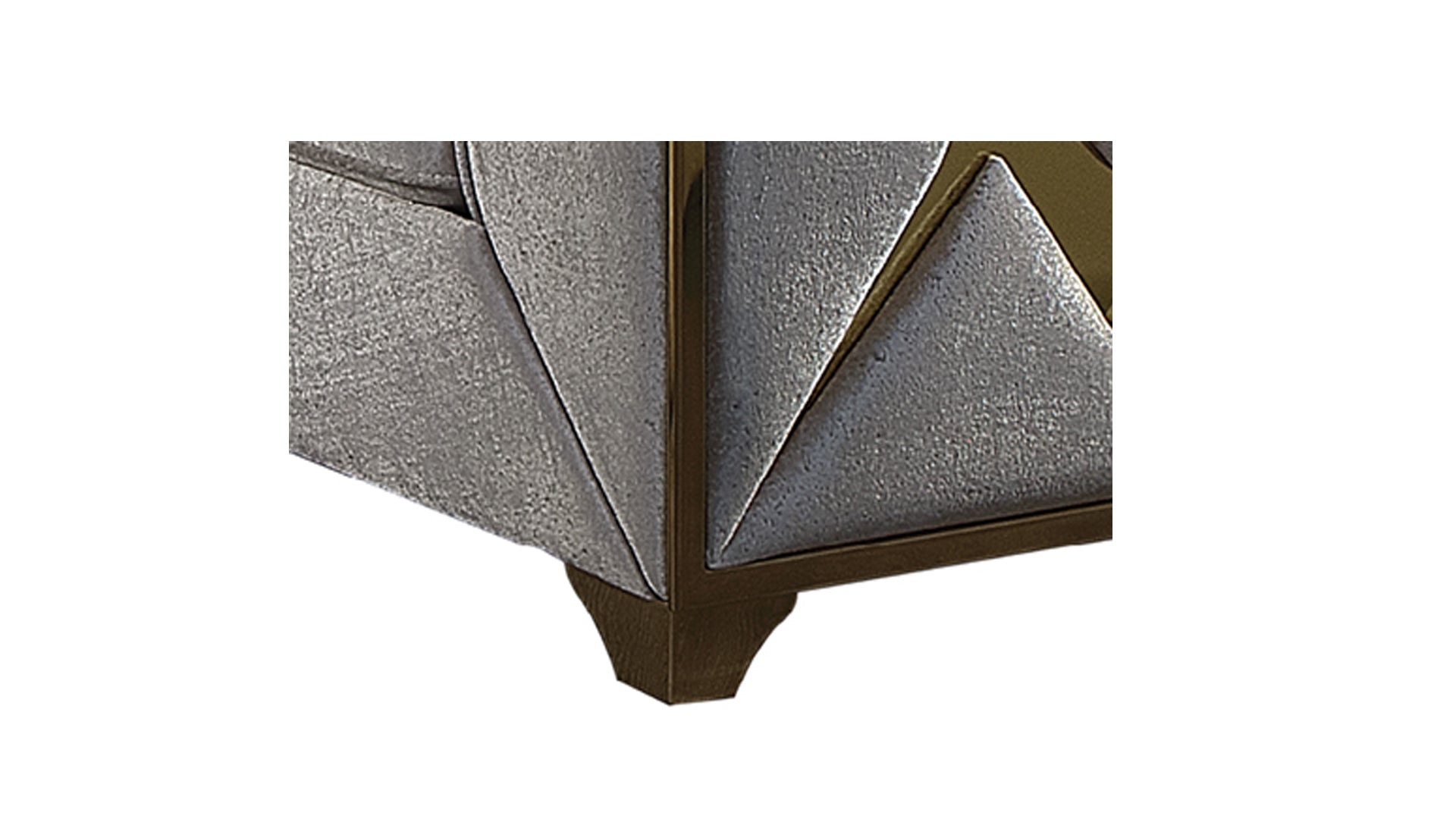 Modern grey textured sofa arm with gold trim and a dark wood foot showcasing contemporary design