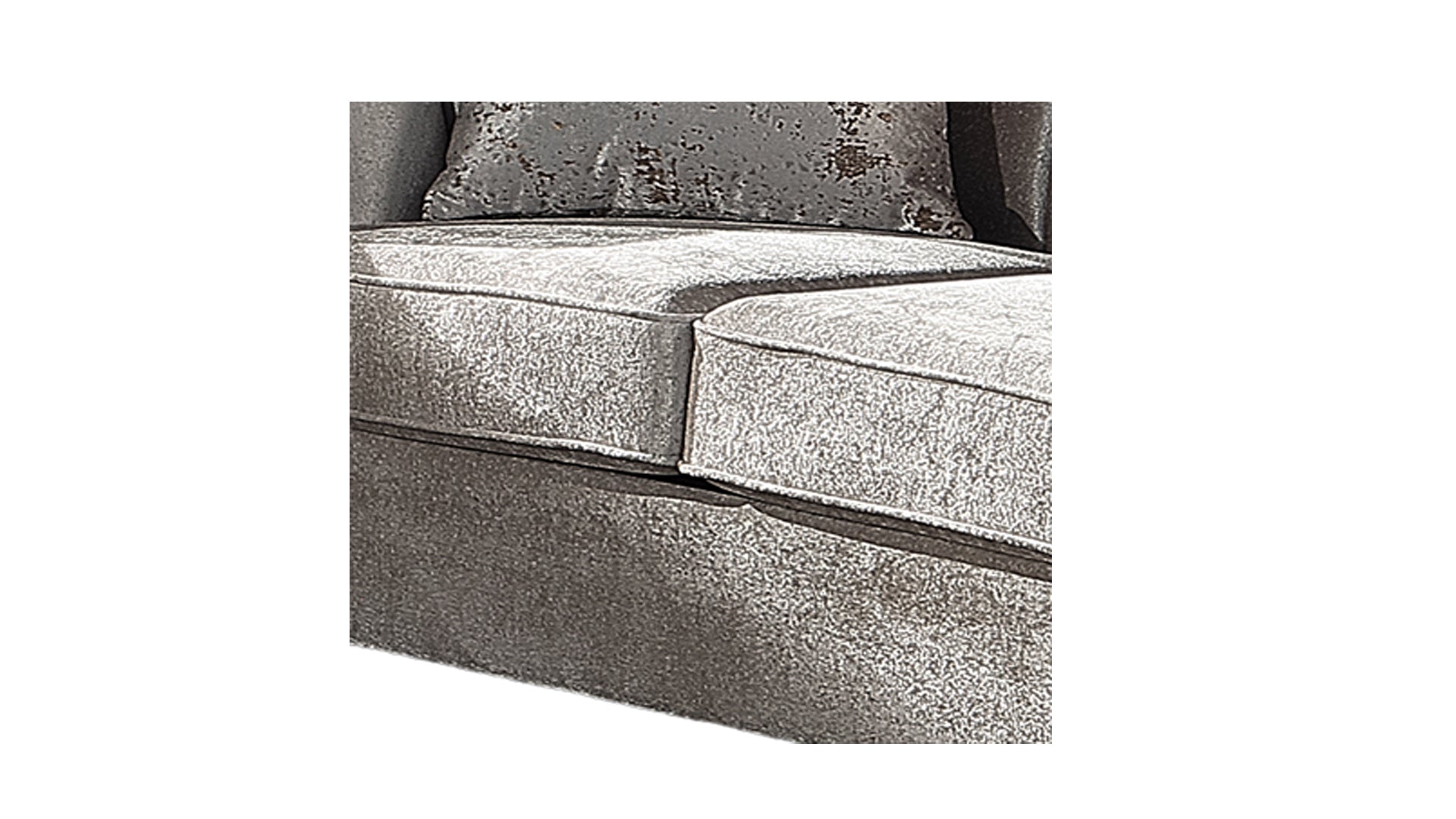 Close up of silver crushed velvet sofa cushions with a textured throw pillow