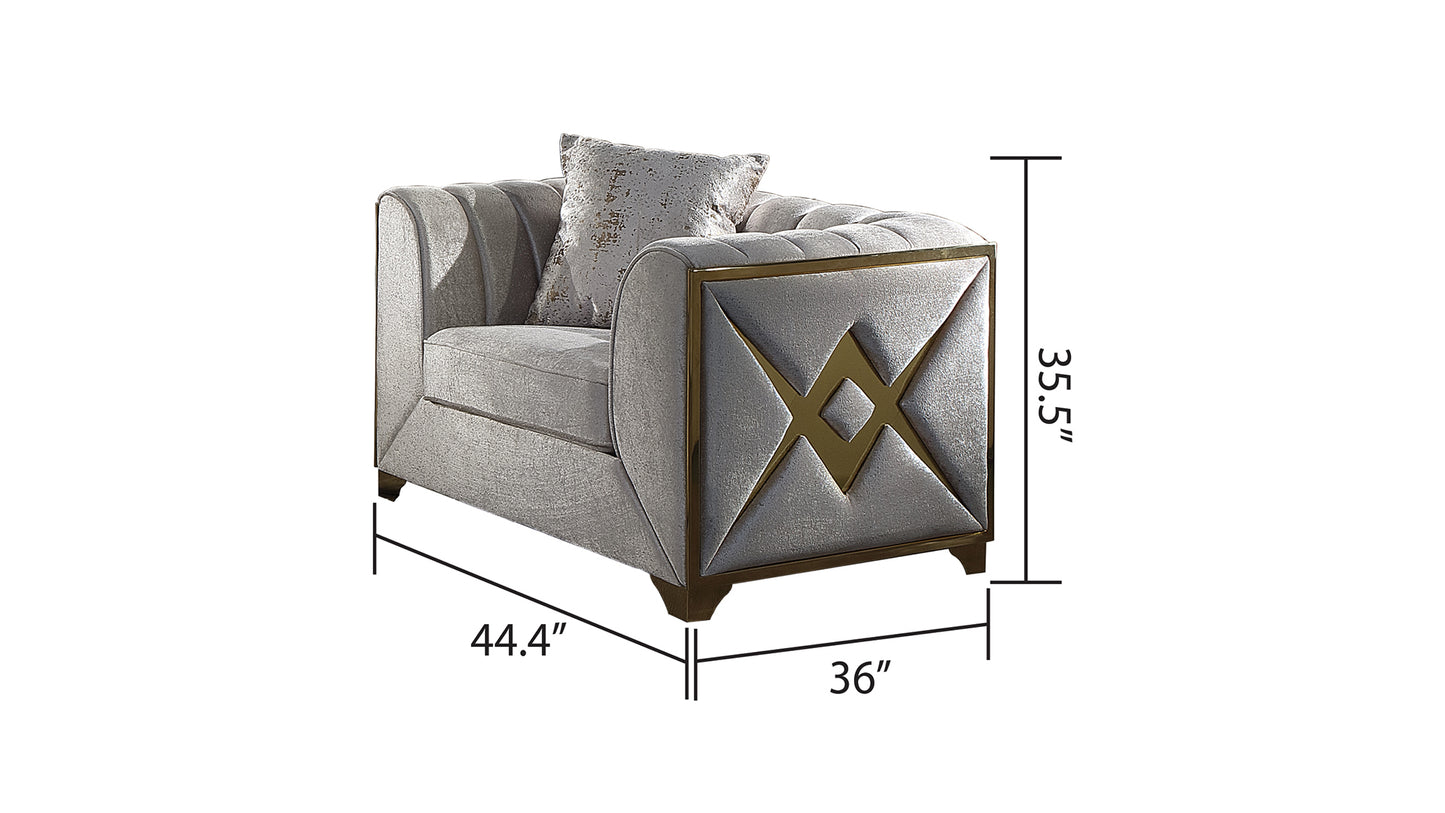 Gray velvet accent chair with gold geometric inlay and tufted backrest