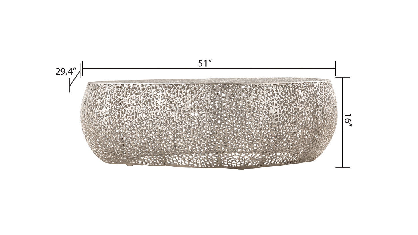 Modern silver metal coffee table with intricate cutout pattern and oval shape