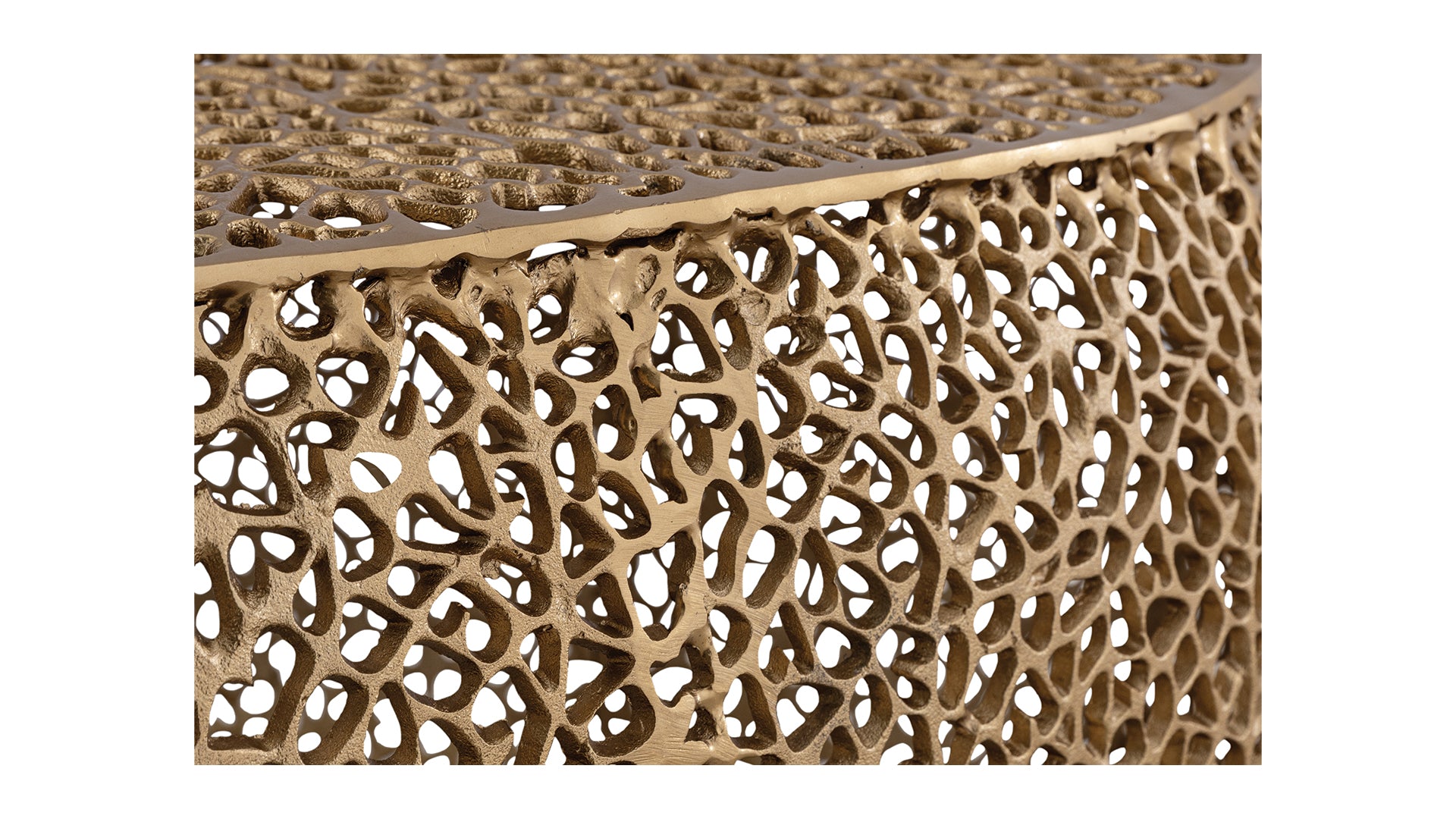 Gold abstract decorative accent table with intricate cutouts and organic pattern