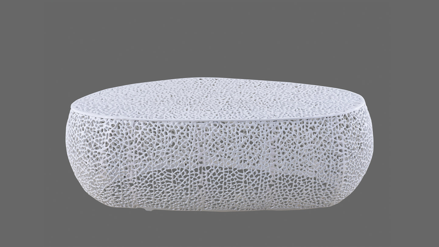 White modern coffee table with intricate cutout design