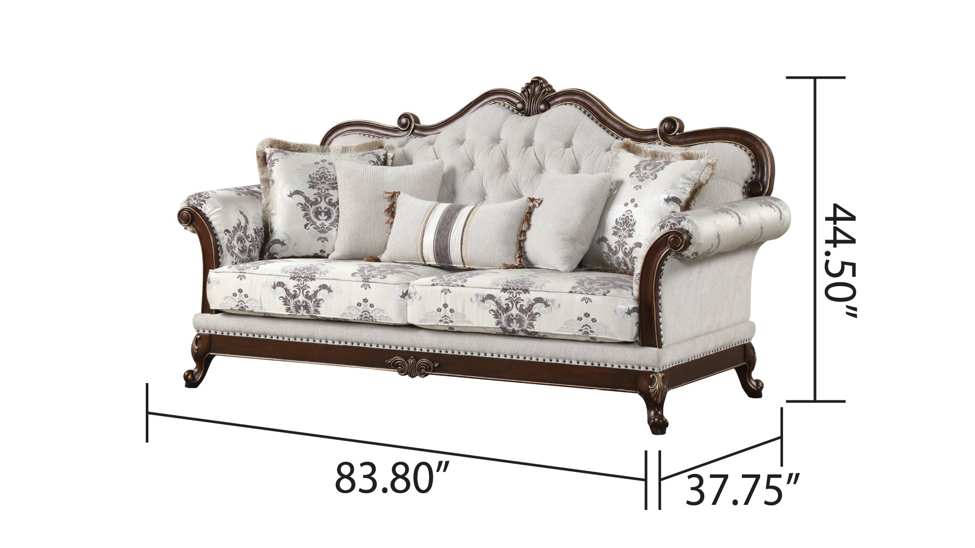 Elegant antique sofa with tufted back ornate carvings and floral patterned upholstery