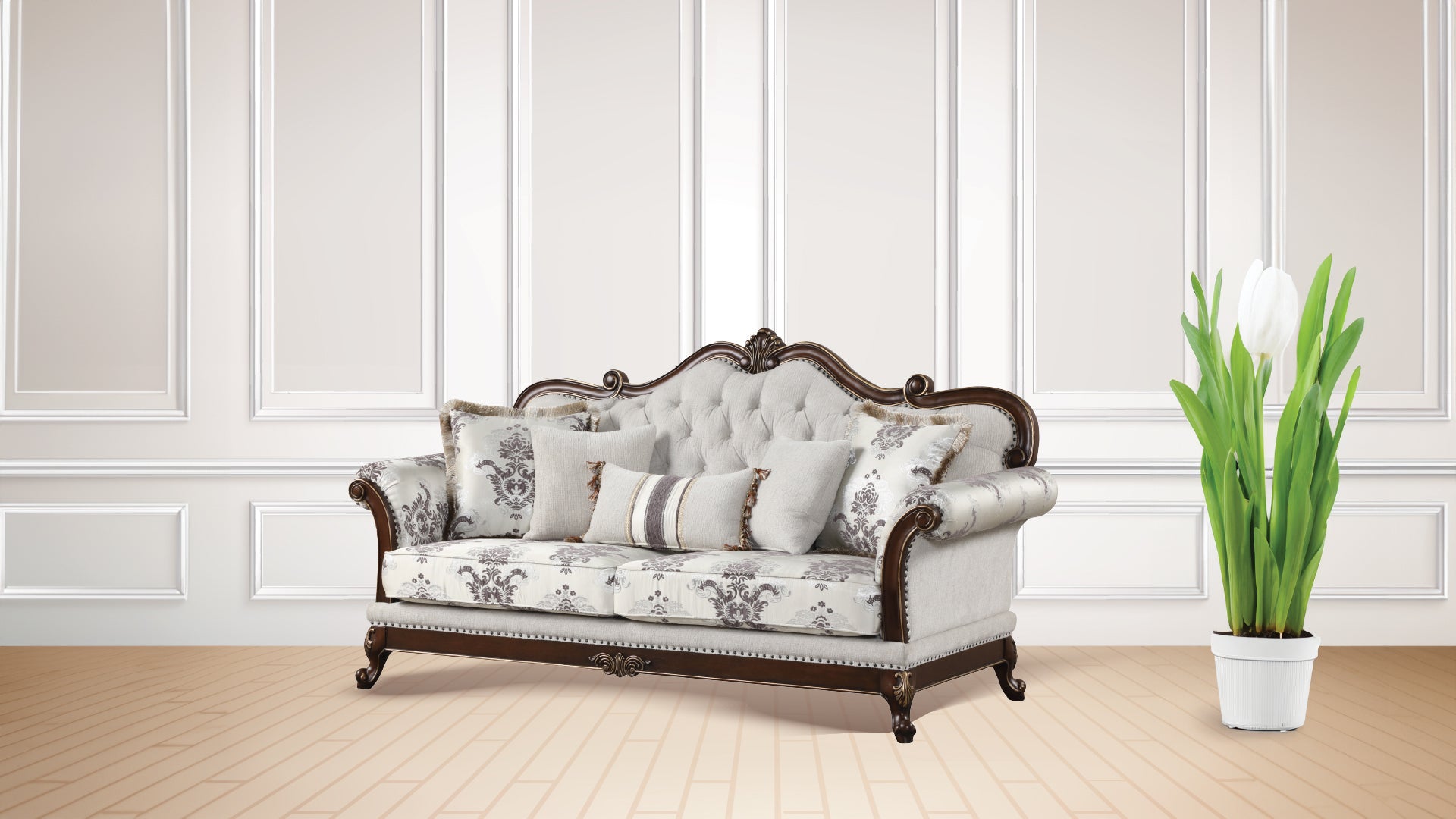 Victorian style sofa with ornate carved wood frame and damask upholstery