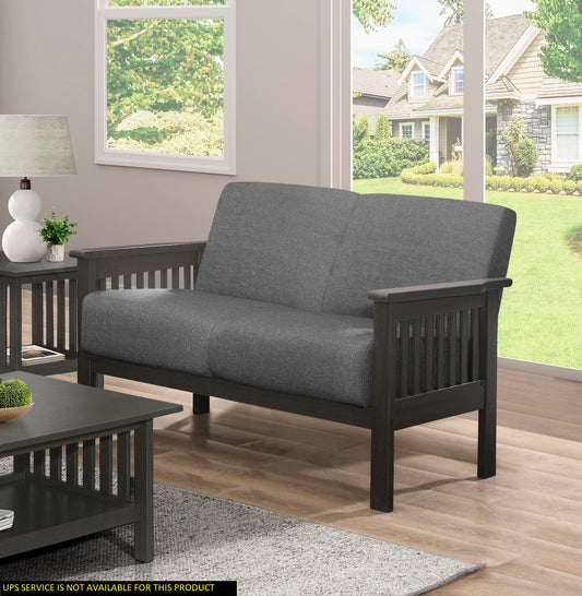 Dark wood frame sofa with grey fabric upholstery Mission style arms and back slats