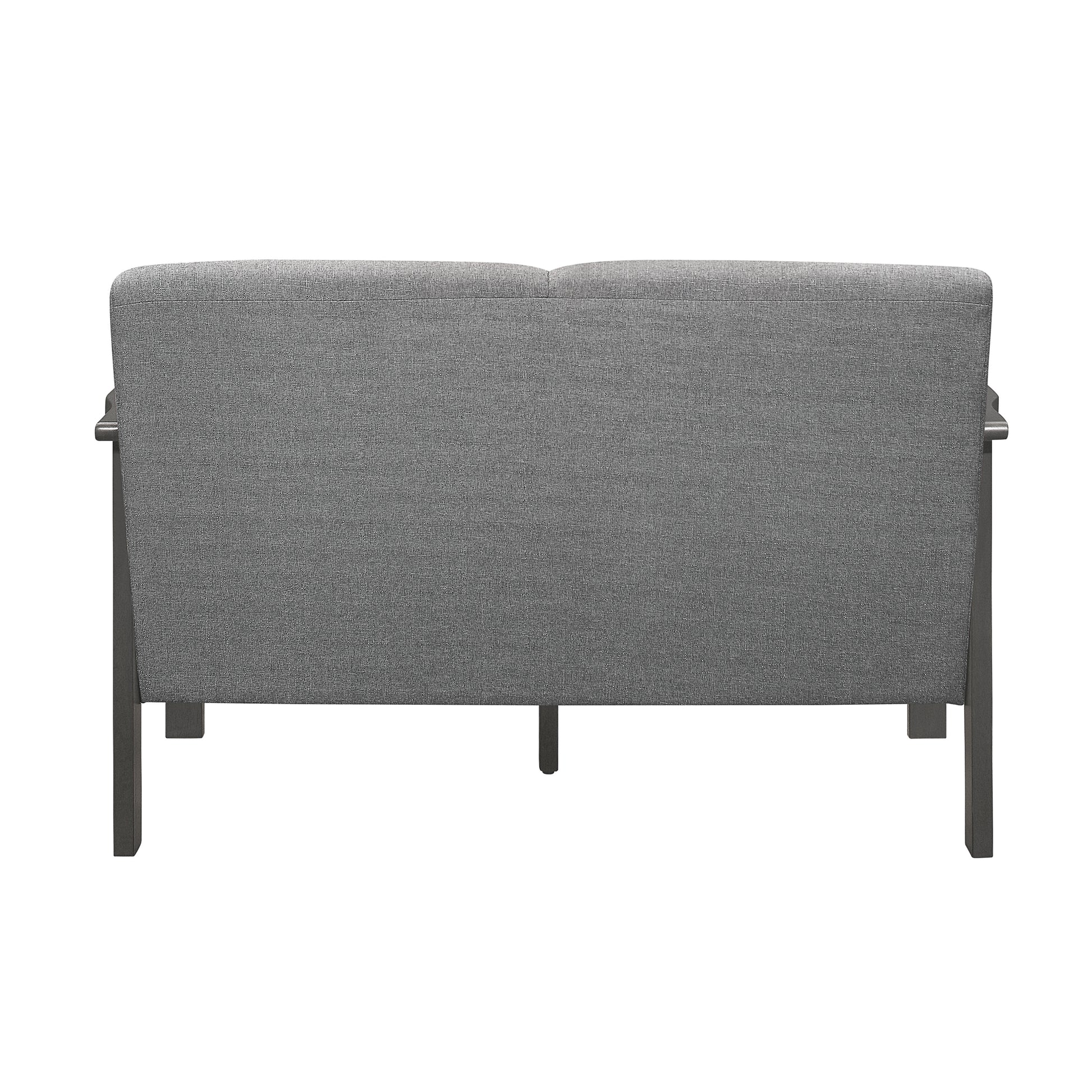 Back view of a modern grey fabric loveseat with dark wood frame suitable for small living spaces