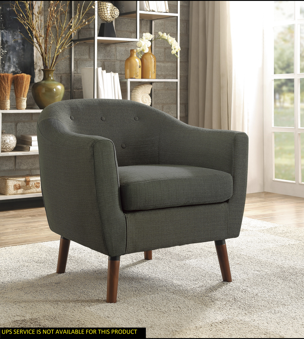 Charcoal gray upholstered accent chair with button tufting and tapered wooden legs