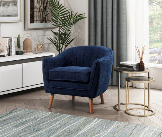 Deep blue textured armchair with channel tufting and wooden legs