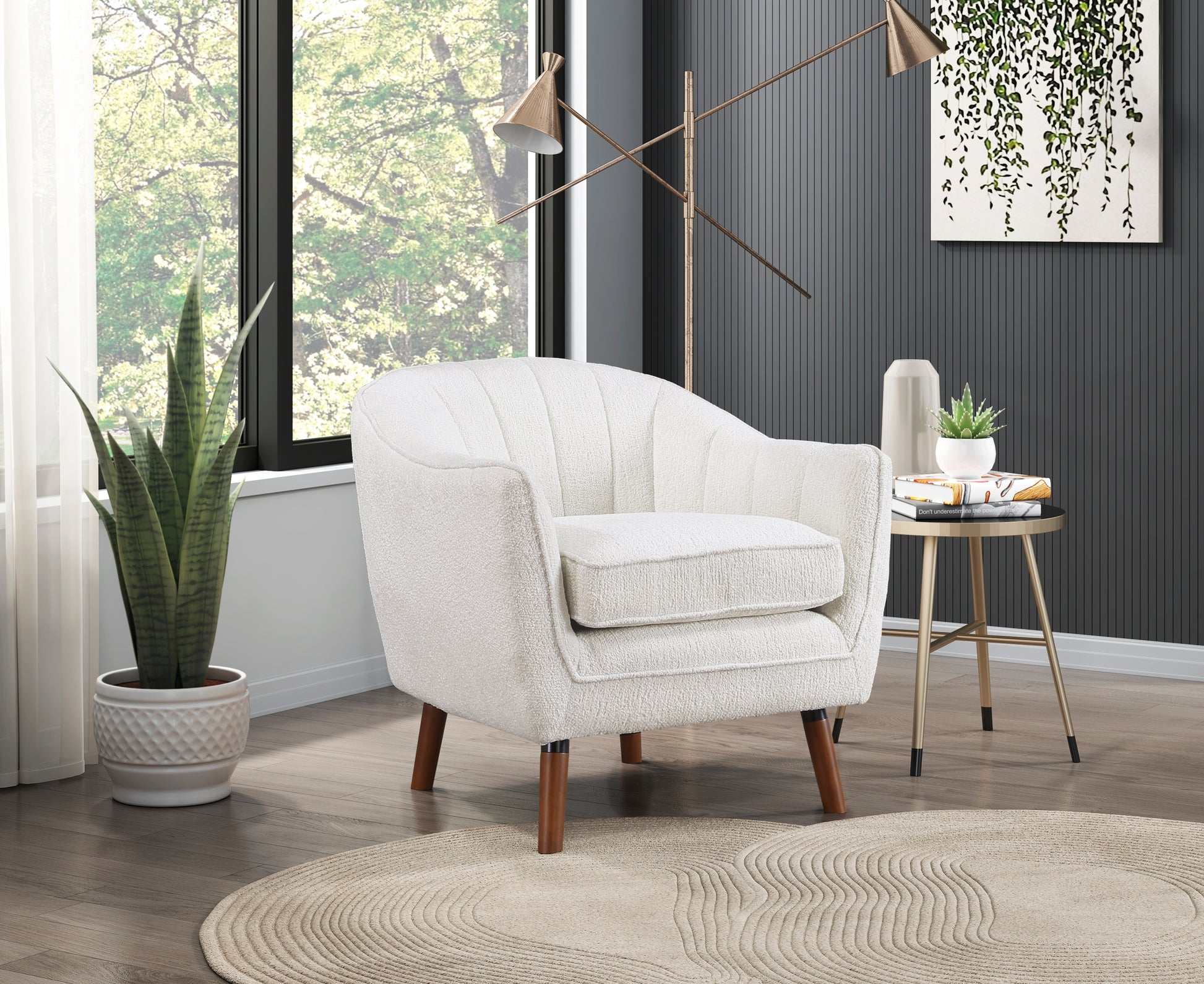 White boucle accent chair with channel tufting and tapered wooden legs