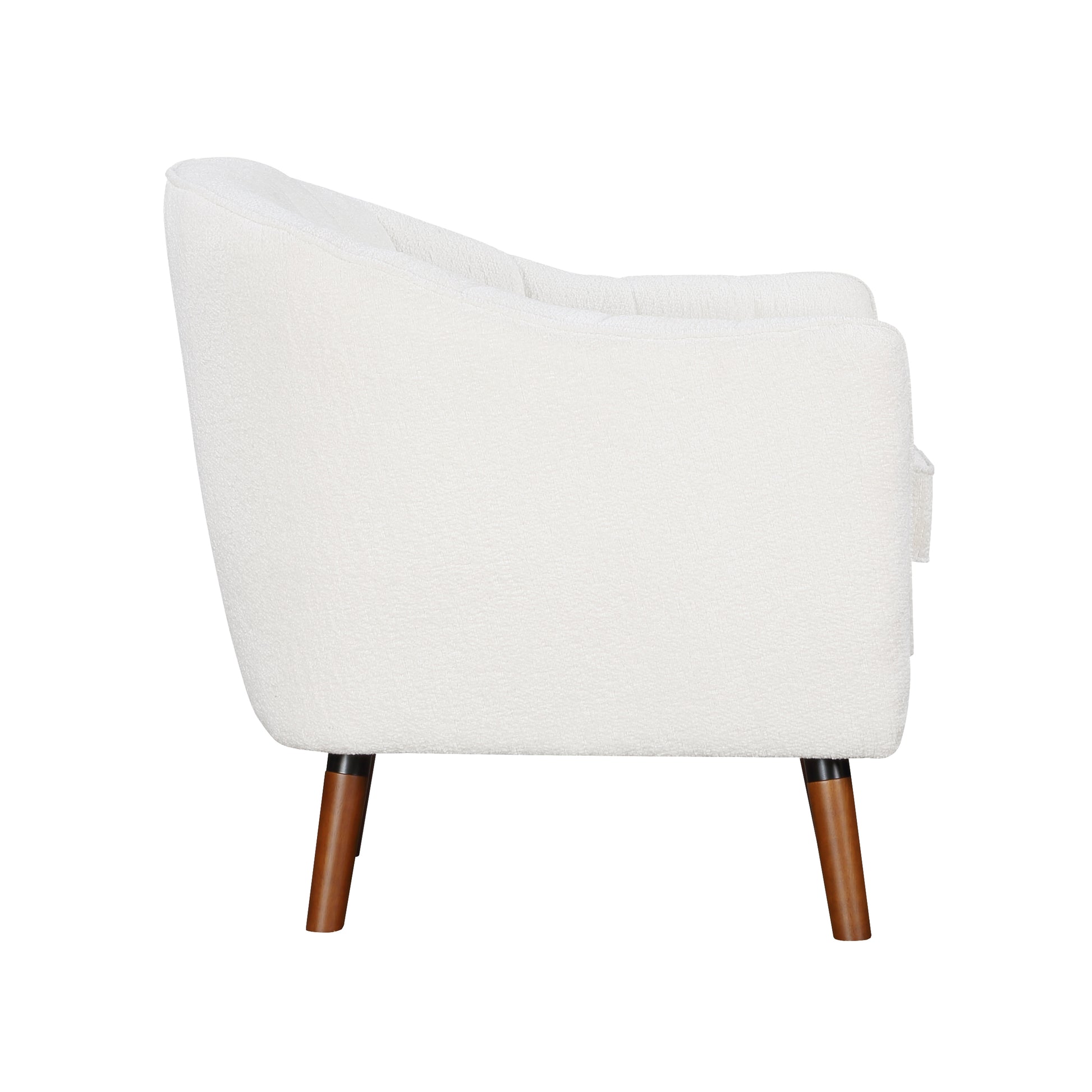 Cream boucle accent chair with tapered wooden legs a cozy addition to any living room