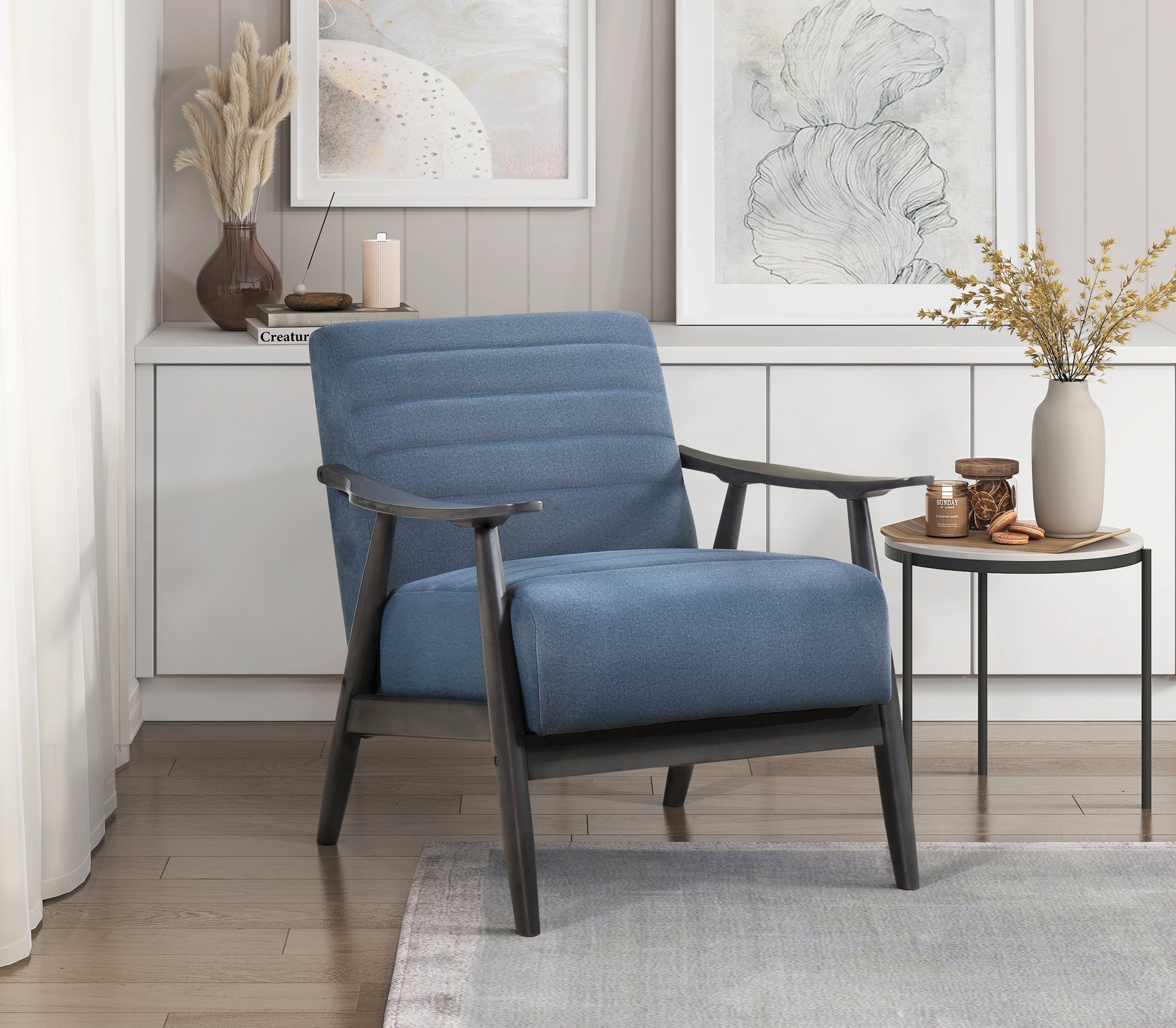 Midcentury modern accent chair in textured blue fabric with dark wood arms and legs