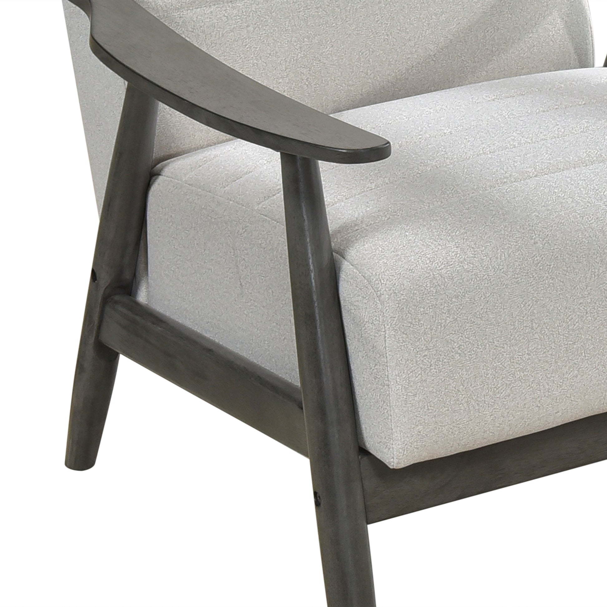 Closeup of a midcentury modern armchair with textured light gray fabric and dark gray wood arms