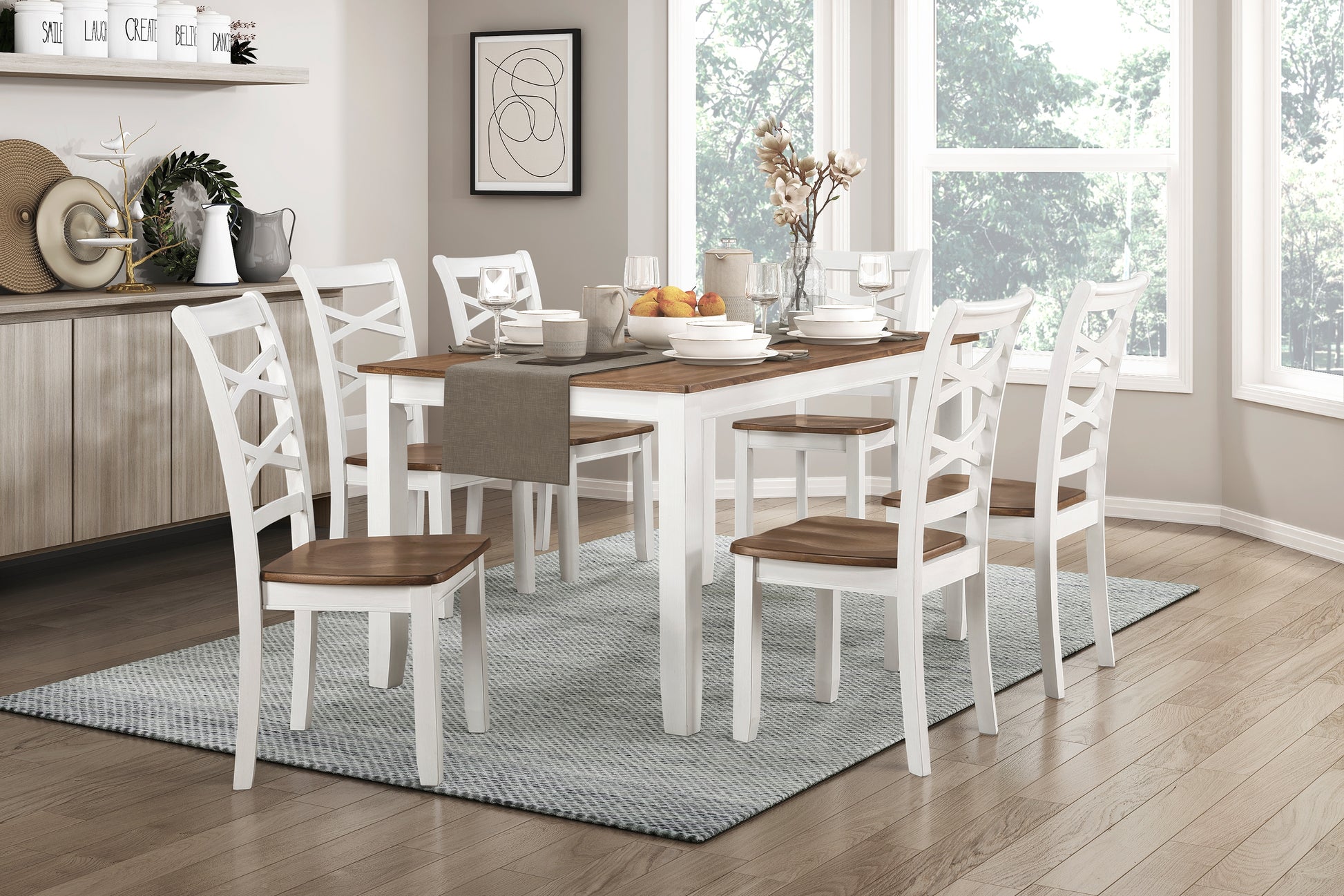 Elegant white and wood dining chairs with crisscross backs around a rustic table