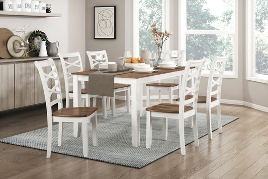 Elegant white and wood dining chairs with crisscross backs around a rustic table