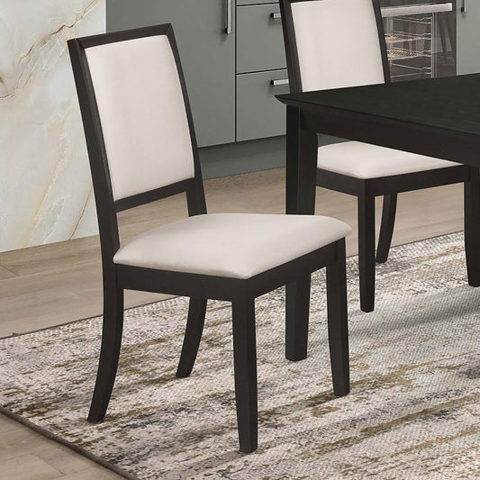 Dark wood dining chair with cream upholstered seat and back