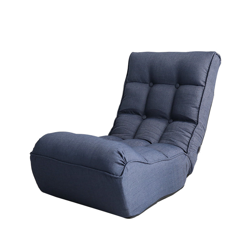 Blue tufted floor chair with adjustable back for comfortable lounging
