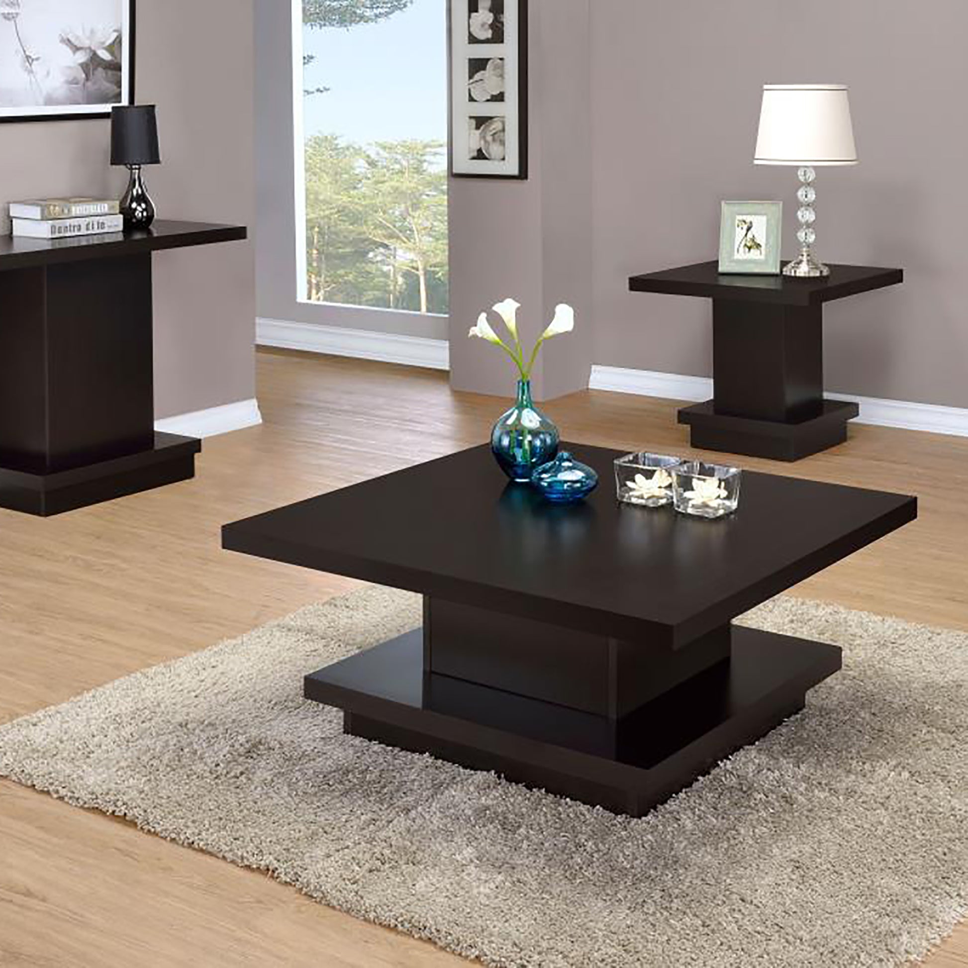 Modern dark wood coffee table with stacked base and clean lines ideal for living rooms