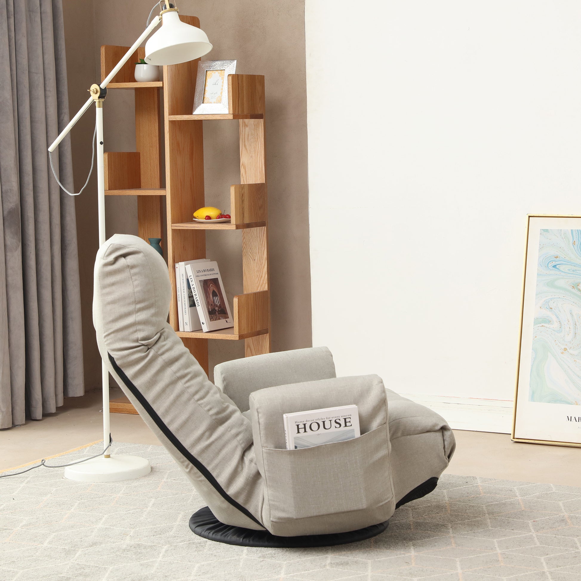 Beige fabric recliner chair with adjustable backrest and builtin side pocket perfect for a cozy living room