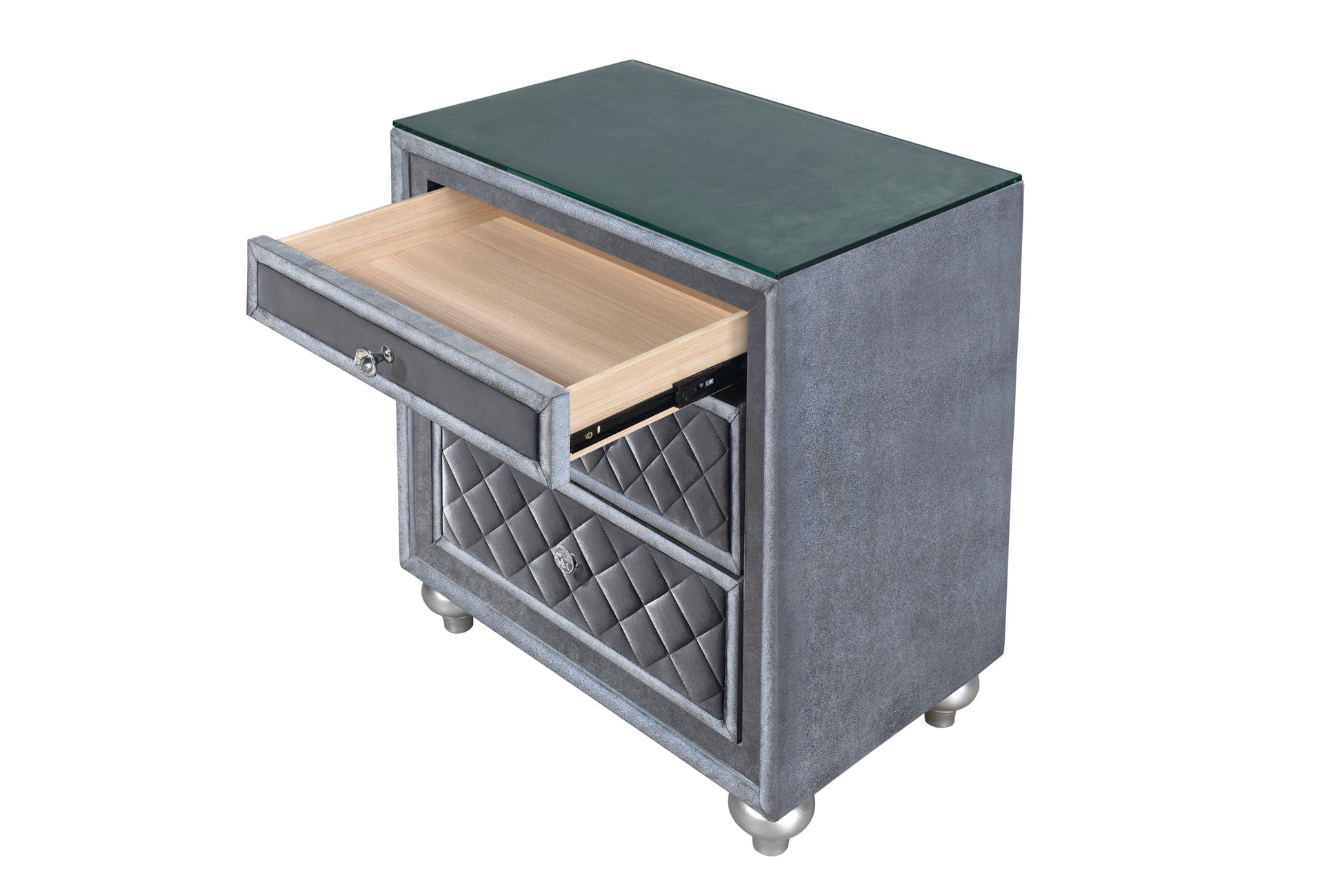 Gray upholstered nightstand with a glass top and one open drawer featuring diamond tufting