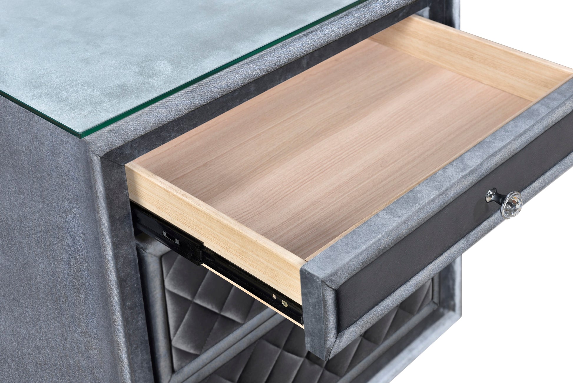 Gray fabric nightstand with an open drawer and crystal knob