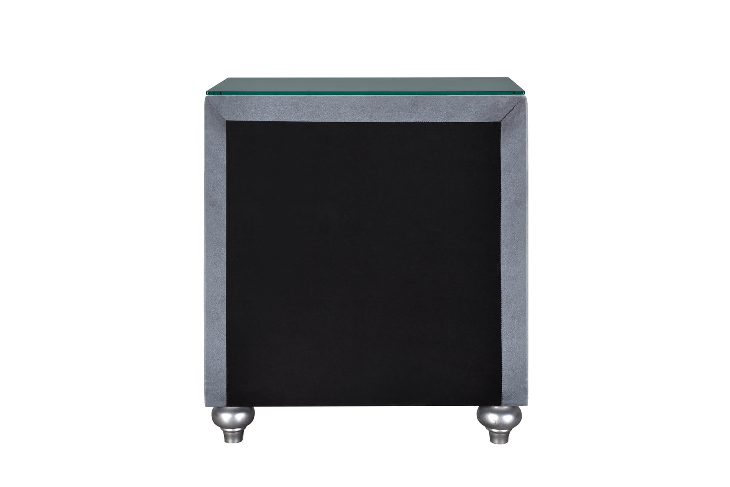 Elegant gray velvet nightstand with black drawer and metallic bun feet