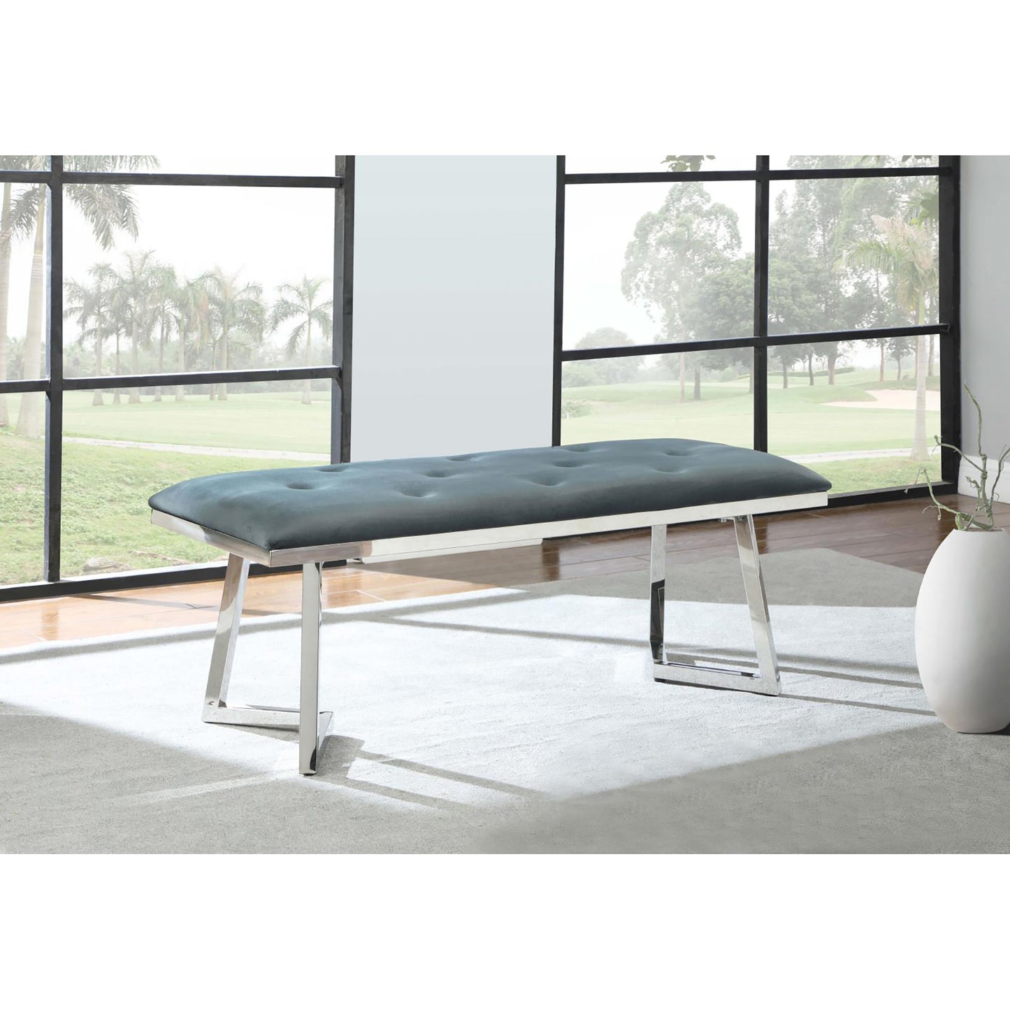 Tufted grey velvet bench with polished chrome legs perfect for modern entryways